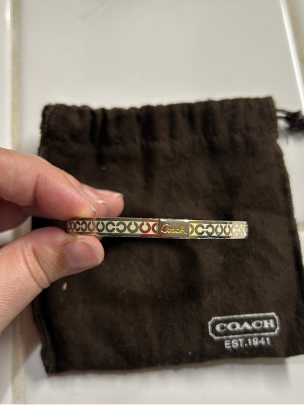 Coach Gold-Tone Signature Logo Cuff Bracelet
